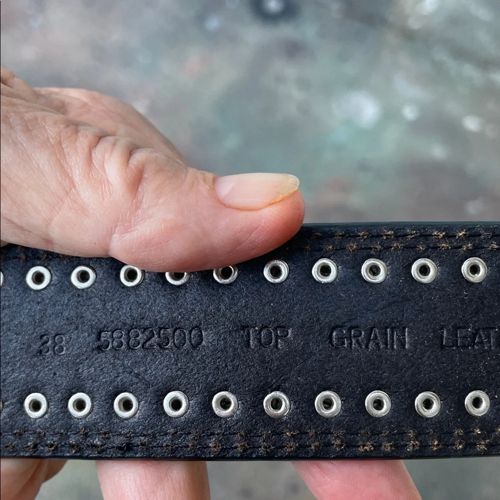 Engraved silver and studded, leather cowboy belt